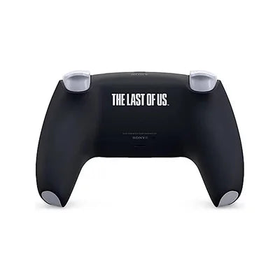 A black Sony PlayStation 5 controller skin featuring the white text 'THE LAST OF US.' printed across the center, shown against a plain white background.
